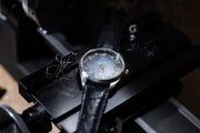 Todd Reed watch made with Stainless steel, sterling silver, 18 karat yellow gold, and raw diamonds(~.68ct) on a leather strap